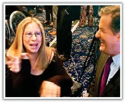  ??  ?? GIGGLES: Barbra Streisand meets Piers Morgan at an event in 2012