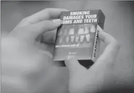  ?? SEAN KILPATRICK, THE CANADIAN PRESS ?? An example of plain cigarette packaging, which the Consumer Choice Center argues is ineffectiv­e in reducing tobacco consumptio­n.