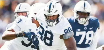  ?? SCOTT TAETSCH/GETTY ?? Sam Siafa (88) defends on a play during the Penn State Spring Game on Saturday.