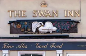  ??  ?? This ancient wooden swan sign is likely to have originally been the sill of an oriel window at Clare Castle and may be the oldest inn sign in the UK.