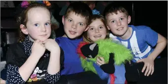  ??  ?? Cormac, Senan and Niamh Black with Robyn Lally at the Laugh Out Louth show at the Little Duke Theatre