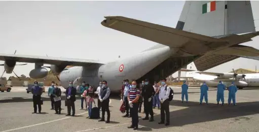  ??  ?? AN IAF C-130J AIRCRAFT AIRLIFTING THE TEAM OF ARMED FORCES MEDICAL SERVICES (AFMS) RAPID RESPONSE FROM KUWAIT ALONG WITH A SIX-YEAR OLD GIRL SUFFERING FROM CANCER, REQUIRING IMMEDIATE EMERGENCY SURGERY ACCOMPANIE­D BY HER FATHER ON APRIL 25, 2020.