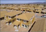  ?? REBECCA NOBLE — BLOOMBERG ?? New homes under constructi­on in Tucson, Ariz., on Feb. 22.