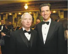  ?? Deanne Fitzmauric­e / The Chronicle 2004 ?? Judge William Newsom and his son, then-Mayor Gavin Newsom, at a dinner honoring both Newsoms in 2004.