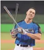  ?? GETTY IMAGES ?? Aaron Judge of the Yankees celebrates with the trophy after winning the T-Mobile Home Run Derby on Monday.