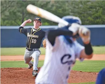  ?? STAFF PHOTOS BY MATT HAMILTON ?? North Murray’s Spencer Chasteen pitches to Coahulla Creek’s Pedro SanMartin during Thursday’s GHSA Region 6-AAA game at Coahulla Creek. The host Colts won 15-3 to improve to 6-3 in the region.