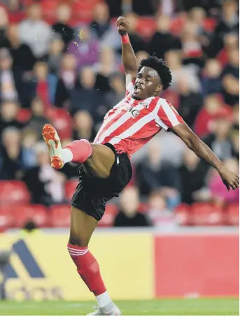  ??  ?? Josh Maja stretches for the ball in last night’s clash.