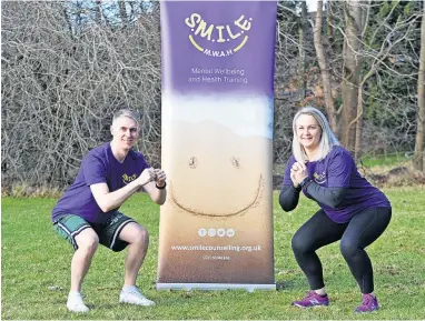  ?? ?? Charity champ Christophe­r is pictured with Sarah Henley, marketing and fundraisin­g coordinato­r from Smile.