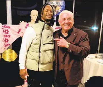  ?? Arash Markazi Los Angeles Times ?? LEGENDARY WRESTLER Ric Flair, right, became friends with Rams running back Todd Gurley when Gurley was at Georgia, and even Flair wondered what had happened to Gurley in the Super Bowl.