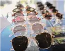  ?? ?? Sunglasses for sale at Penfield Collective, a new store selling laid back, luxury apparel, in Sconset Square.