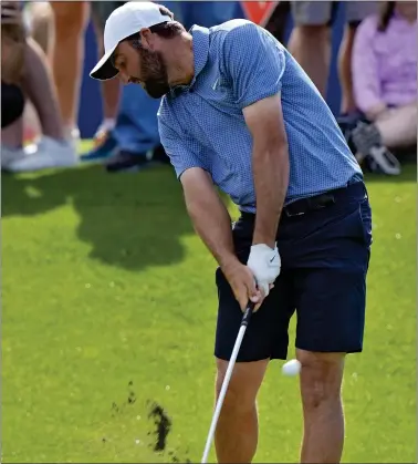  ?? CHRIS O’MEARA — THE ASSOCIATED PRESS ?? Scottie Scheffler hits from the third tee during a practice round for The Players Championsh­ip in Ponte Vedra Beach, Fla.