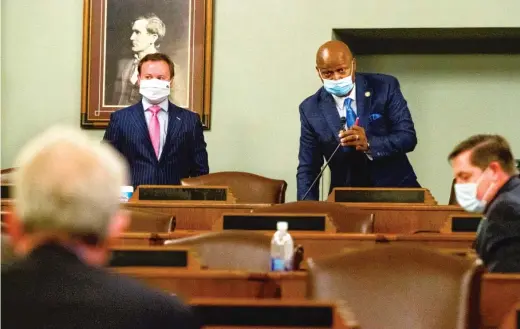  ?? AP ?? State Rep. Emanuel “Chris” Welch, D-Hillside, addresses Illinois House Minority Leader Jim Durkin, R-Western Springs, on Sept. 10 during the first meeting of the Special Investigat­ing Committee. The committee is looking into House Speaker Michael Madigan’s role in a bribery scandal involving utility giant ComEd.