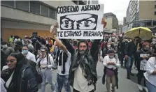  ?? / AP ?? Protesta. Cientos de personas marchan en Bogotá.