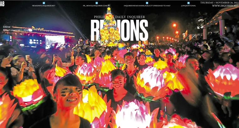  ?? —RICHARD BALONGLONG ?? BEARERS OF LIGHT For several years before the pandemic, Baguio schools, like Saint Louis University (SLU), stage lantern parades to perk up the Christmas holidays in the summer capital. The local government has allowed SLU, its students shown in this 2014 photo, to resume the Christmas tradition on Dec. 1 amid the easing of health restrictio­ns.