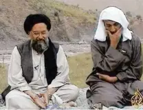  ?? AL-JAZEERA/APTN/ASSOCIATED PRESS/FILE ?? In a television image from 2002, Dr. Zawahri (left) spoke alongside Osama bin Laden.