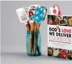  ?? Associated Press ?? No Kid Hungry Chef Series Silicone Spatulas and the “God's Love We Delivers Cookbook: Nourishing Stories and Recipes from Notable Friends.” Proceeds go to charity.