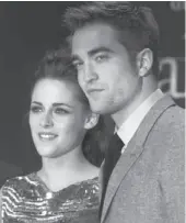  ?? AP PHOTO ?? Kristen Stewart and Robert Pattinson attend the German premiere of The Twilight Saga: Breaking Dawn Part II in Berlin on Friday.