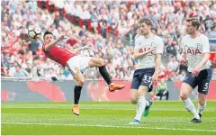  ?? REUTERS ?? Manchester United’s Alexis Sanchez scores their first goal against Tottenham.