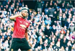  ?? AFP ?? Manchester United midfielder Paul Pogba celebrates scoring his side’s second goal in their Premier League match against Manchester City on Saturday night.