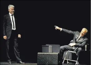  ??  ?? Chefs Anthony Bourdain (standing) and Eric Ripert perform “‘Good vs. Evil,’ ” a night of storytelli­ng in 2013 at The Pearl inside the Palms.