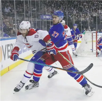  ?? BRUCE BENNETT/GETTY IMAGES ?? Rangers captain Ryan McDonagh takes Max Pacioretty to the boards Tuesday night at Madison Square Garden. While he had a strong regular season, Pacioretty has only one assist in four first-round games and needs to start producing for his team, writes...