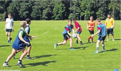  ??  ?? Youngsters from the age of eight to 16 can improve their rugby skills at Glenalmond College’s summer camp.