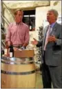  ?? ANNE NEBORAK — DIGITAL FIRST MEDIA ?? Chris Le Vine, owner of Grace Winery, and state Sen. Thomas Killian talk about new liquor laws in Pennsylvan­ia.