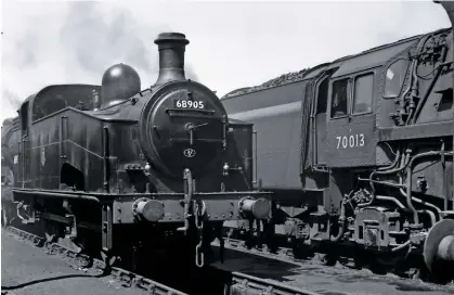  ?? K.C.h. faIRey/COlOUR RaIl ?? This scene of the original ‘J50’ No. 68905 alongside the now-preserved ‘7MT’ No. 70013 Oliver Cromwell at Norwich on May 26 1957 is unlikely ever to be recreated, based on the J50 Group’s current rate of progress.