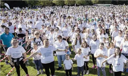  ??  ?? ●●Thousands turned out to take part in the Alzheimer’s Society’s Memory Walk in Greater Manchester