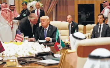  ?? Evan Vucci / Houston Chronicle ?? Secretary of State Rex Tillerson speaks with President Donald Trump during a meeting with leaders at the Gulf Cooperatio­n Council Summit on Sunday in Riyadh, Saudi Arabia.