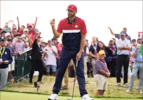  ?? Charlie Neibergall / Associated Press ?? Team USA’s Dustin Johnson reacts to his putt on the 15th hole during a Ryder Cup singles match at the Whistling Straits Golf Course on Sunday in Sheboygan, Wis.