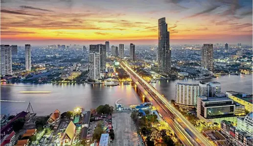  ?? FLIGHT CENTRE ?? Discover the delights of Bangkok, including the spectacula­r 360-degree views of the city form the Octave Rooftop Lounge & Bar.