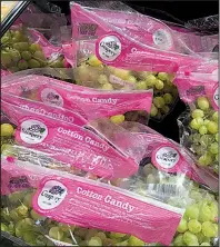  ?? Arkansas Democrat-Gazette/NATHAN OWENS ?? Cotton Candy grapes were displayed for sale recently at Fayettevil­le’s Whole Foods grocery.