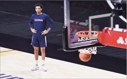  ?? Jessica Hill / Associated Press ?? UConn’s James Bouknight during warmups before the Huskies’ game against USC on Thursday at Mohegan Sun. UConn played only one of its three scheduled games in “Bubblevill­e,” losing two opponents to positive COVID-19 tests.