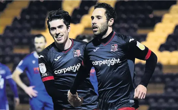  ?? Micah Crook/PPAUK ?? Exeter’s Robbie Willmott celebrates his goal in the 2-1 win at Colchester United on Tuesday, his first goal since joining on loan from Newport