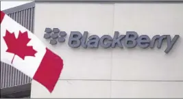  ?? CP PHOTO ?? Waterloo, Ont.-based BlackBerry will stop making its signature smartphone­s, the company announced Wednesday.