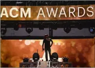  ?? CHRIS PIZZELLO/INVISION/AP) ?? Jason Aldean is shown performing at the 2015 Academy of Country Music Awards. This year’s awards air Sunday on CBS.