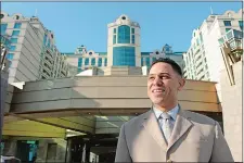  ?? SEAN D. ELLIOT/THE DAY ?? Mashantuck­et Pequot Tribal Chairman Rodney Butler poses for a photo outside of the tribe’s Foxwoods Resort Casino in 2012. Last month, the council named Butler, 41, the interim chief executive officer of Foxwoods following the sudden death of Felix Rappaport.