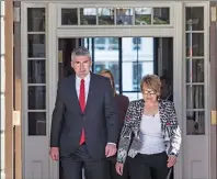  ?? CP PHOTO ?? Nova Scotia Premier Stephen McNeil and his wife, Andre, leave Government House after asking the lieutenant-governor to dissolve the house in order to call a provincial election, in Halifax on Sunday.