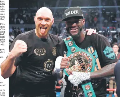  ??  ?? A file photo of Tyson Fury and Deontay Wilder after their fight at Staples Centre, Los Angeles, United States. — Reuters photo