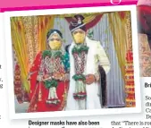  ?? PHOTO: PTI ?? Designer masks have also been in vogue recently