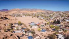  ??  ?? Anapra originally sprang up as squatters’ terrain on the west side of Ciudad Juárez at the border. Over time, the city began delivering services including electricit­y and water.