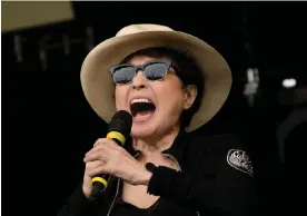  ?? ?? Yoko Ono, performing on the Pyramid stage at Glastonbur­y with the Plastic Ono Band in 2014. Photograph: Photo by Joel Ryan/Joel Ryan/Invision/AP