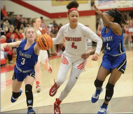  ?? (NWA Democrat-Gazette/Andy Shupe ?? Fort Smith Northside’s Jersey Wolfenbarg­er (center), one of the nation’s top prospects, orally committed to the University of Arkansas on Monday. She said her decision was influenced by the mutual respect she shares with Razorbacks Coach Mike Neighbors.