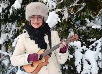  ?? SARAH GORDON/THE DAY ?? Musician Phred Mileski poses outside her home in New London.