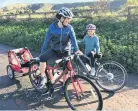  ??  ?? Chloe Smart, nine, is to ride 25 miles from her home to Bath to help homeless people; above Chloe with mum Claire
