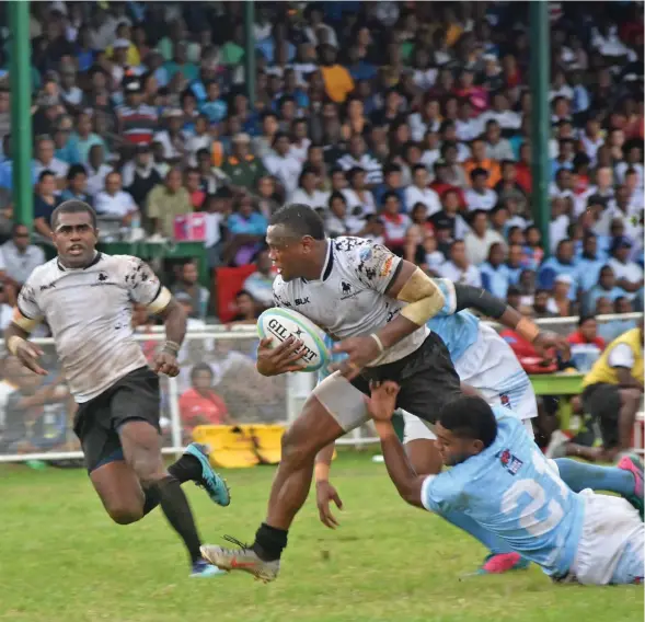  ?? Photo: Waisea Nasokia ?? Amenoni Nasilasila (with ball) of Nadroga leads the charge against Suva during the Farebrothe­r Sullivan challenge match at Nadi’s Prince Charles Park on July 20, 2019. Nadroga won 24-13. Lautoka is the next challenger.