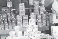  ?? JERMAINE BARNABY/FREELANCE PHOTOGRAPH­ER ?? Corned beef for sale at a stall on East Queen Street in Kingston despite the ban.