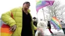  ??  ?? Elzbieta Podlesna, an LGBT and human rights activist, who was tried for adding the rainbow symbol to images of the Black Madonna, walks outside the provincial court in Plock.