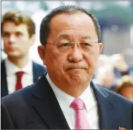 ??  ?? 北韓外長李容浩(左圖)指控，川普的言論挑起戰火。右圖為川普總統對北韓­一直保持高壓的強勢作­風。 (美聯社、路透)